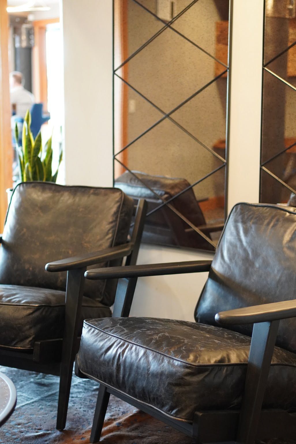 Cozy meeting interior with black chairs — West Lake Office, Ariana Designs