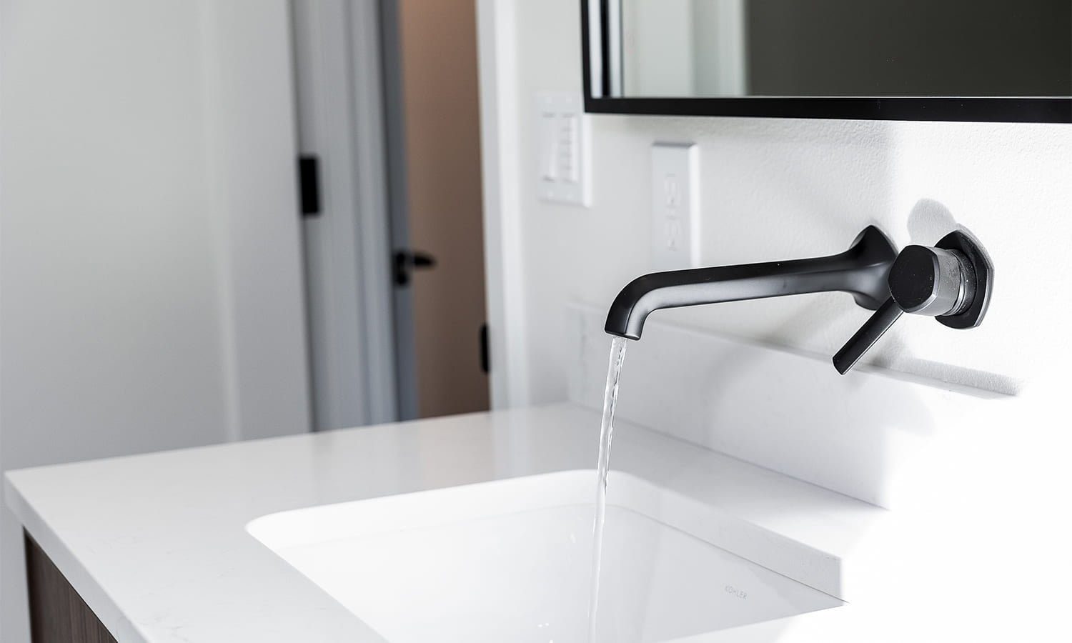 Modern bathroom sink and vanity setup — Kirkland Home, Ariana Designs