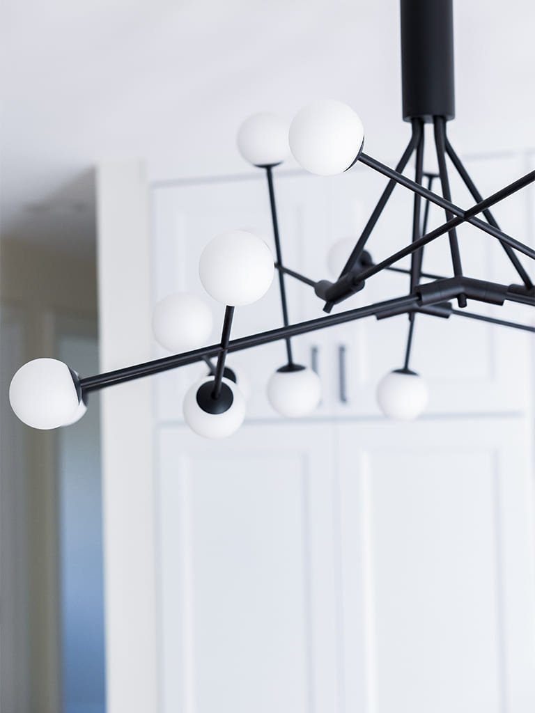 Minimalist chandelier over kitchen island — Kirkland Home, Ariana Designs