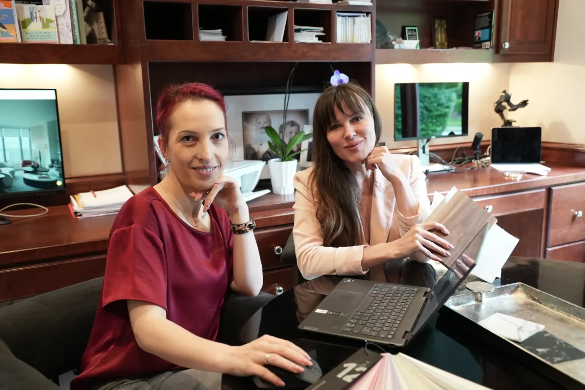 Women collaborating in a stylish office, discussing projects and sharing ideas.
