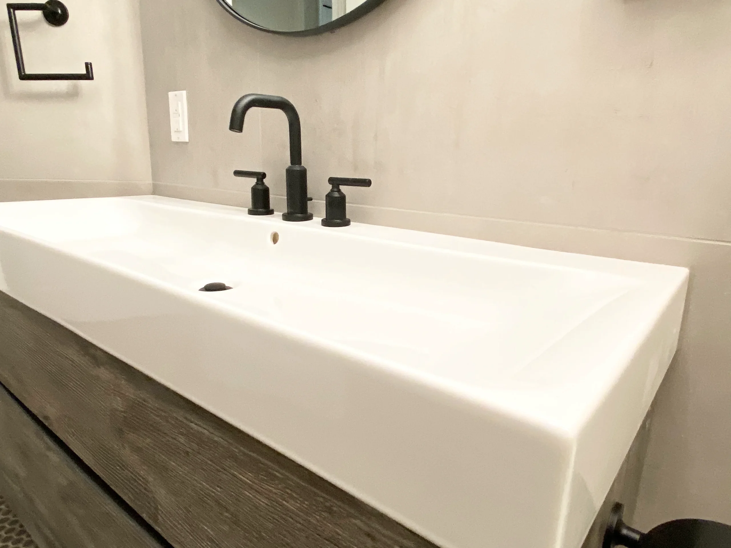Modern sink with white finish and black accents — Ariana Designs, Seattle