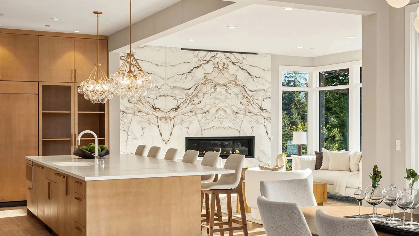 Open-plan kitchen and living area with marble fireplace — Ariana Designs, Bellevue