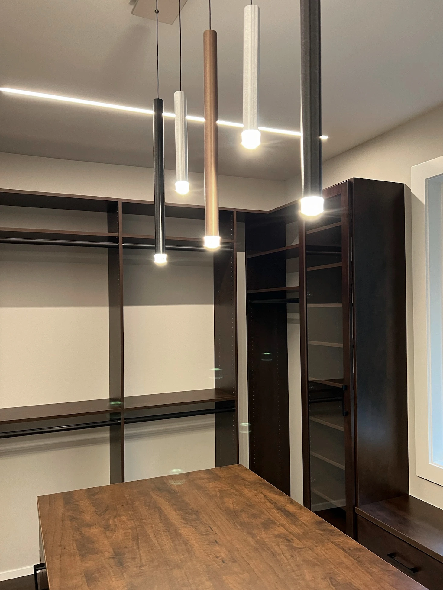 Minimalist closet design with clean lines — Medina, Ariana Designs