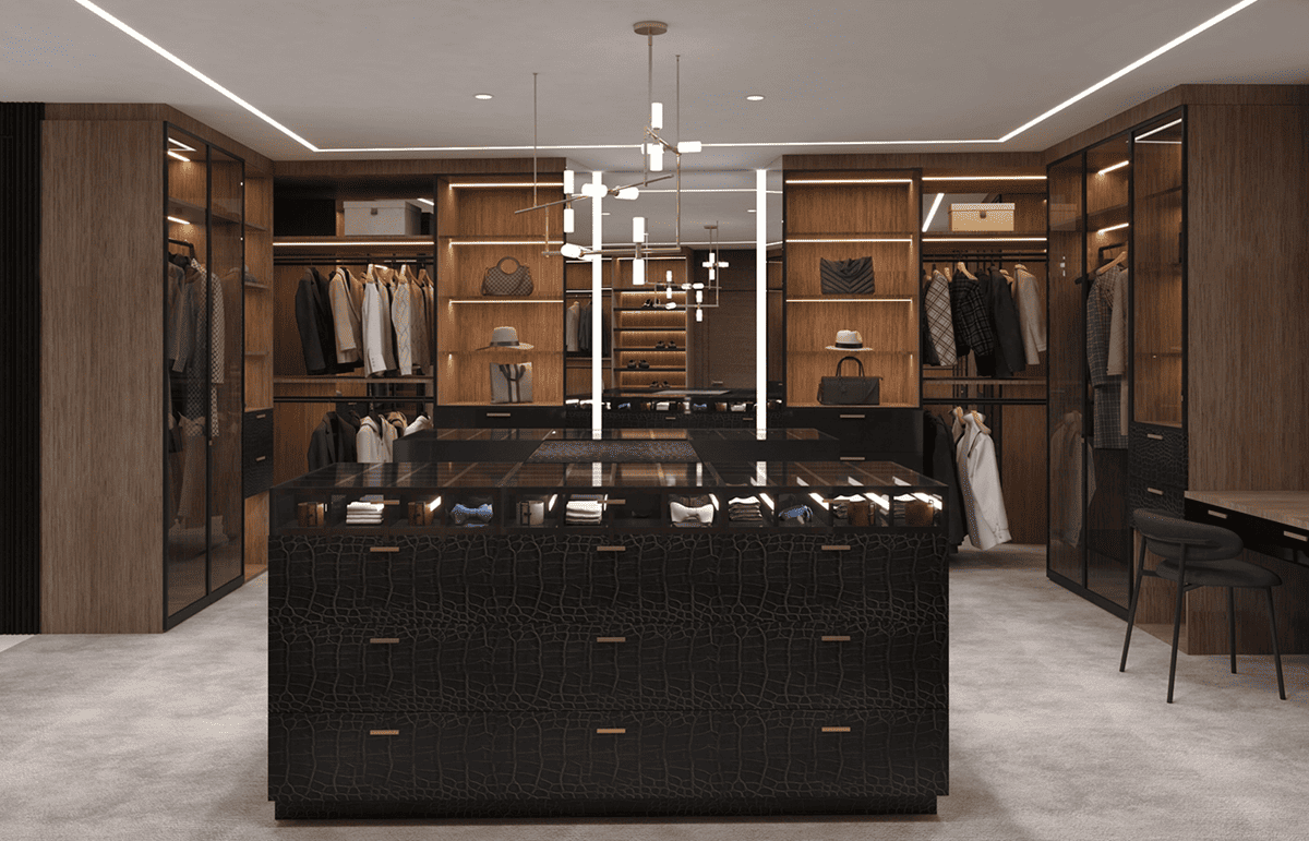 Elegant luxury walk-in closet featuring a stylish display island, wooden cabinetry, and plush carpet.
