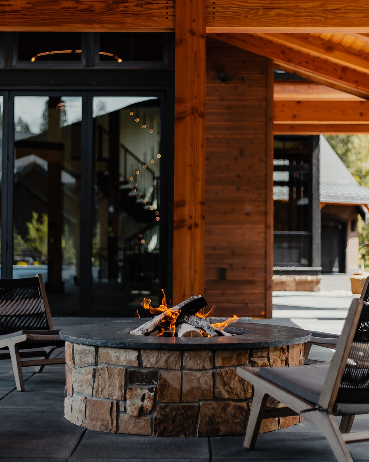 Outdoor fire pit entertaining area — Ariana Designs & Interiors, Suncadia grand retreat