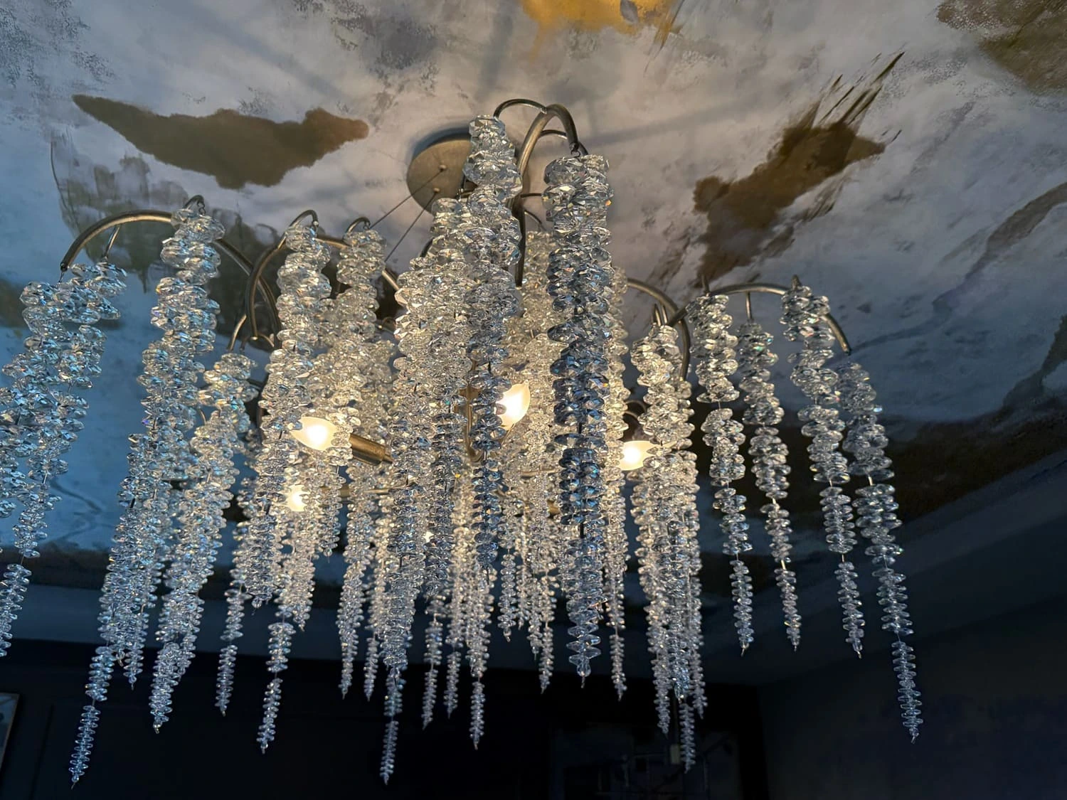 Elegant crystal chandelier bedroom — Ariana Designs, Seattle