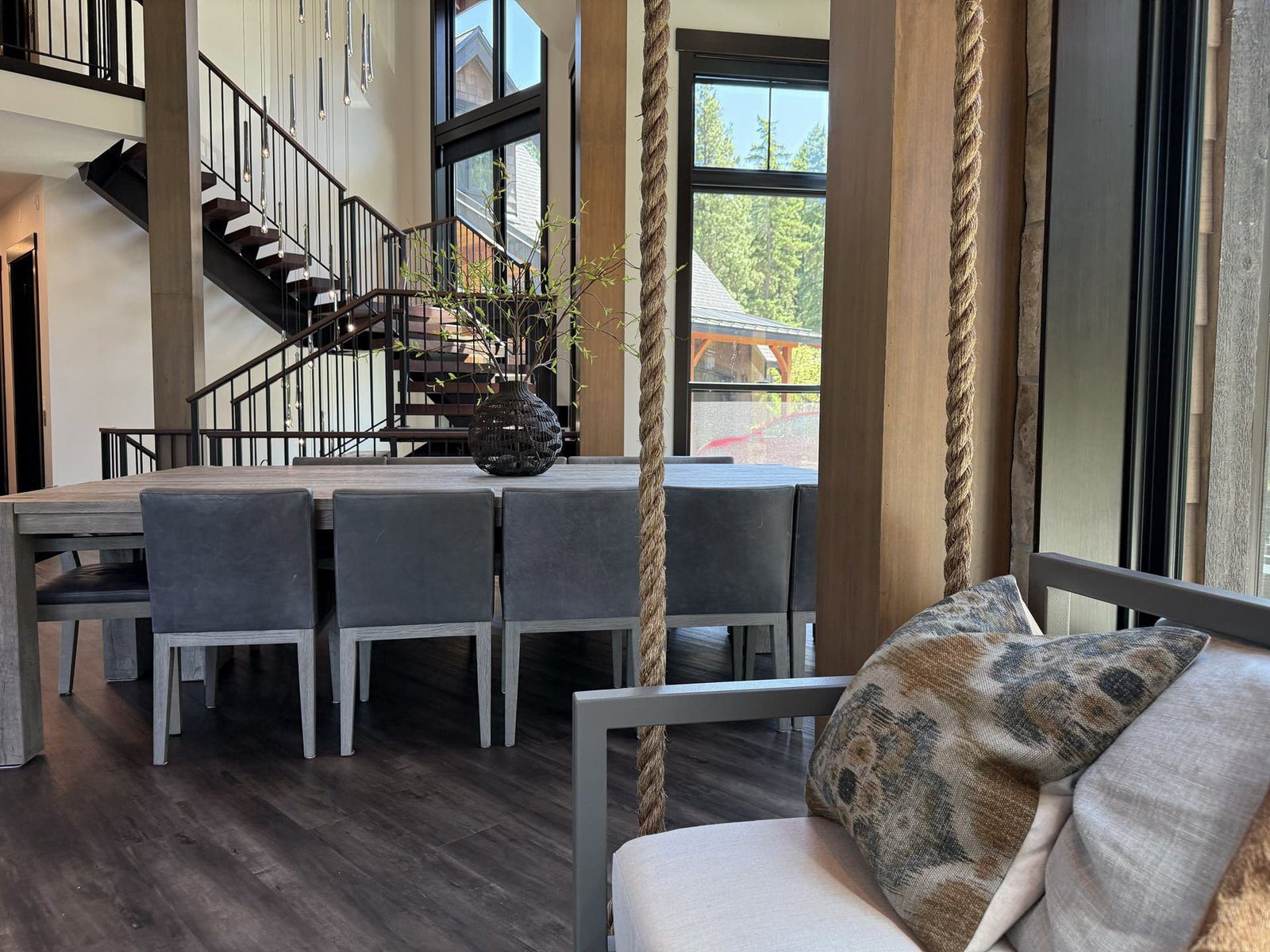 Looking up through open risers at the glass pendant cluster — Suncadia