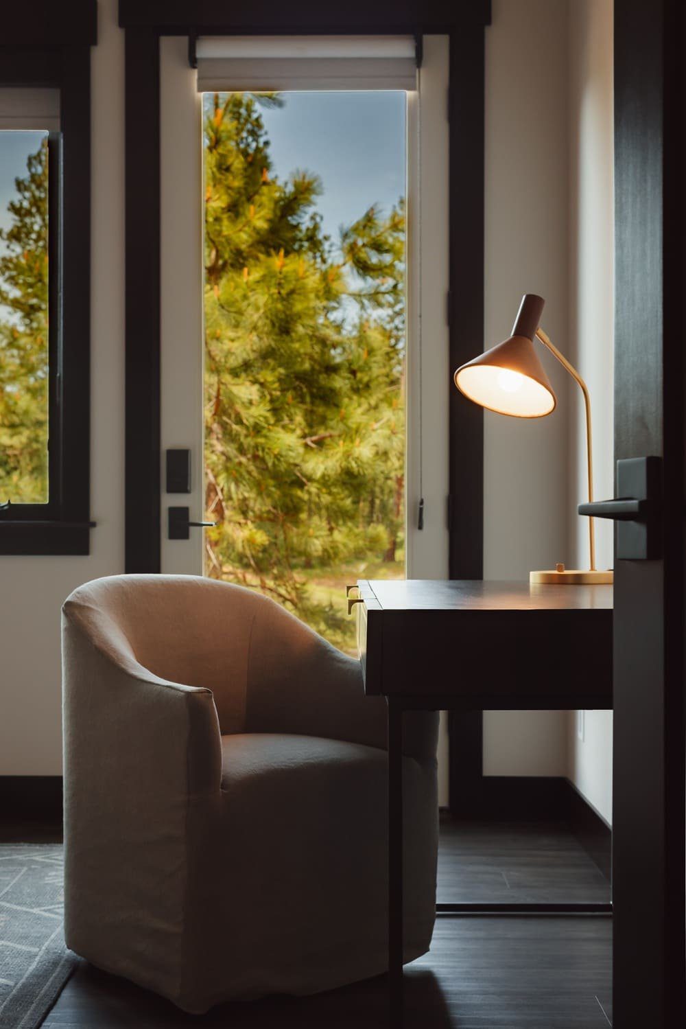 Primary suite balcony and reading chair overlooking the pond — Suncadia